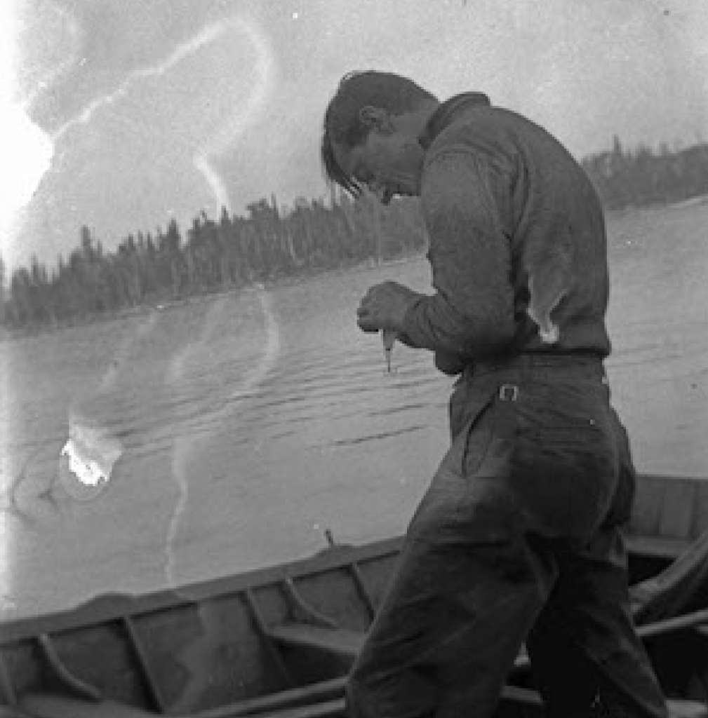 Thomson fishing in Algonquin Park, c. 1914–16. He was enamoured with the Park, and many of his works were painted in the area.